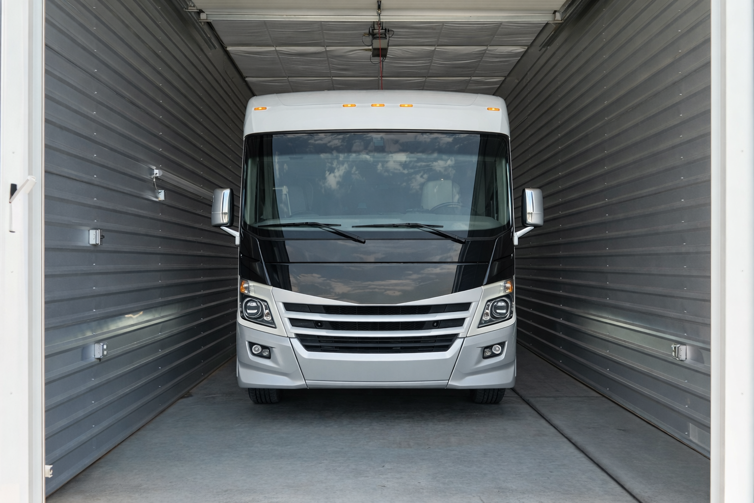 Class A motorhome parked inside a Storage Caves Buford garage condo unit